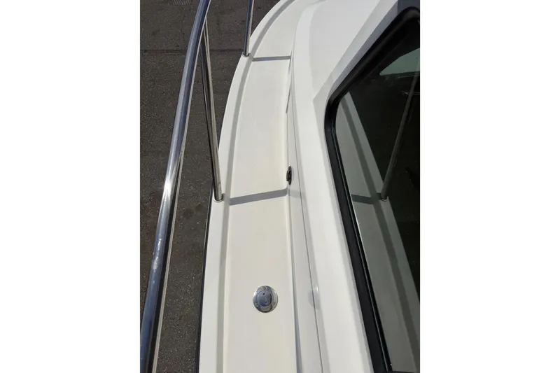 Slide: The Image of 2019 Parker 2320 SL Sport Cabin boat deck with stainless steel railing. - 39