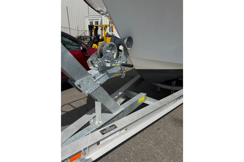 Slide: The Image of Trailer hitch of 2019 Parker 2320 SL Sport Cabin boat in parking lot. - 43