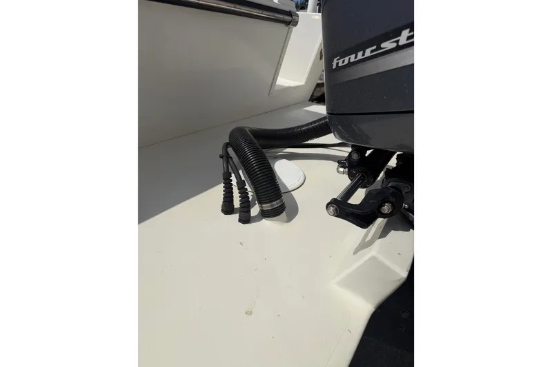 Slide: The Image of 2019 Parker 2320 SL Sport Cabin boat engine detail with cables and fittings. - 48