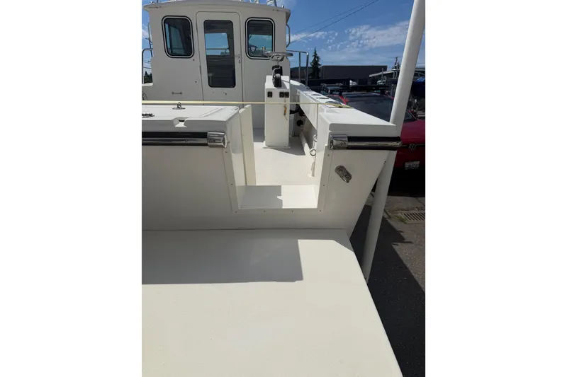 Slide: The Image of 2019 Parker 2320 SL Sport Cabin boat deck and cabin entrance. - 49