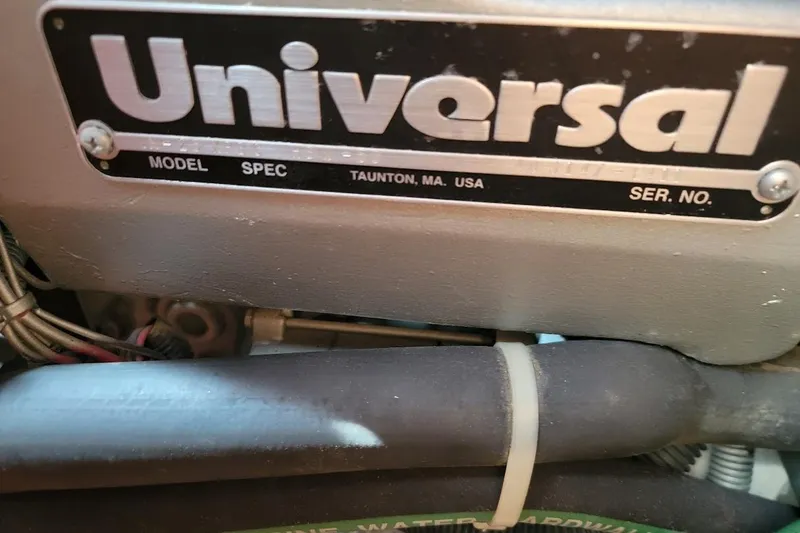 Slide: The Image of Universal engine label on a 2006 Catalina 310 sailboat, Taunton, MA, USA. - 13
