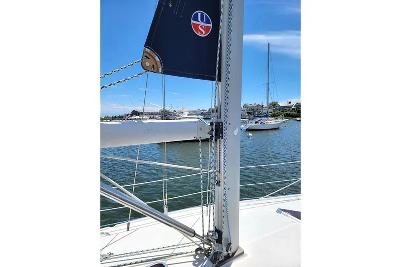 Slide: The Image of Sailboat mast and rigging on a 2006 Catalina 310, docked in a marina. - 18