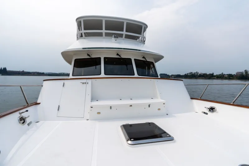 Slide: The Image of 2009 Outer Reef Yachts Motor Yacht deck view on calm waters. - 40