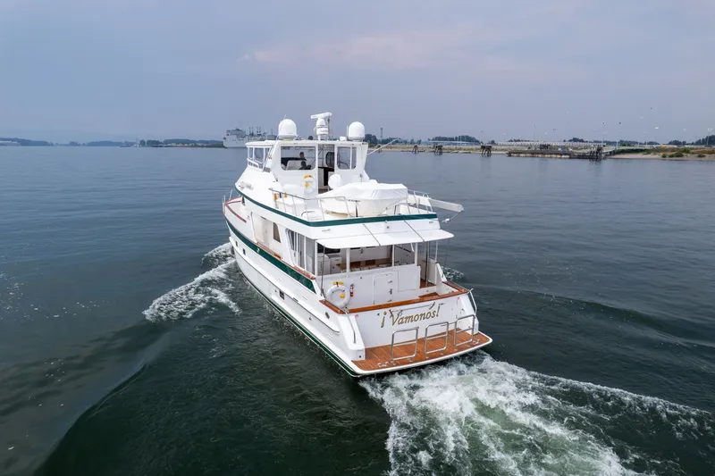 Slide: The Image of 2009 Outer Reef Yachts Motor Yacht cruising on calm waters. - 48
