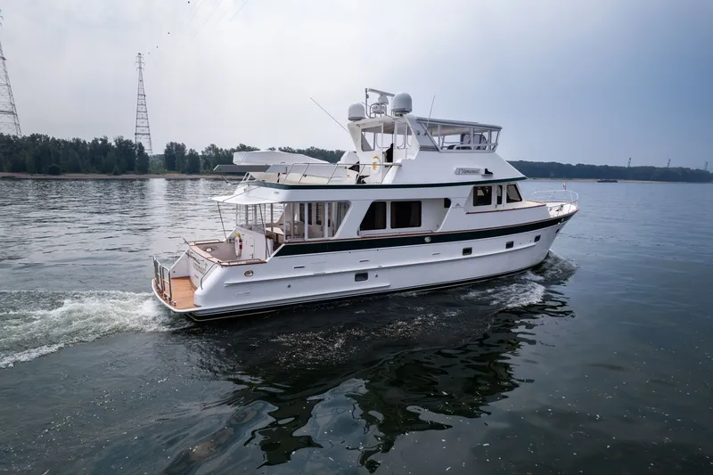 Slide: The Image of 2009 Outer Reef Yachts Motor Yacht cruising on calm waters. - 51