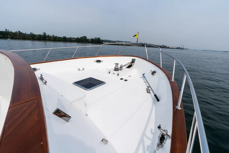 Slide: The Image of 2009 Outer Reef Yachts Motor Yacht bow view on calm waters. - 38