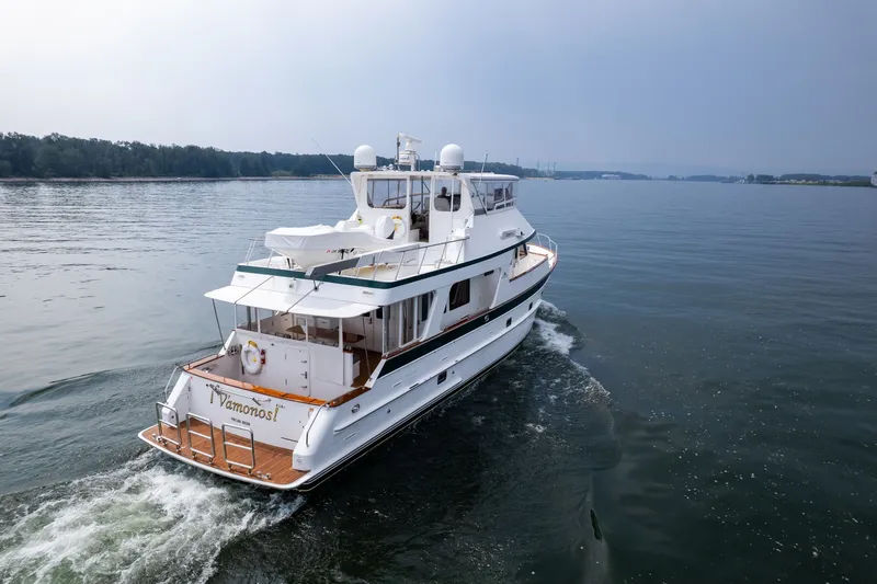 Slide: The Image of 2009 Outer Reef Yachts Motor Yacht cruising on calm waters. - 50