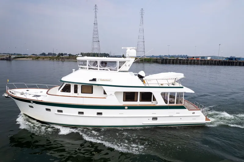 Slide: The Image of 2009 Outer Reef Yachts Motor Yacht cruising on calm waters. - 47