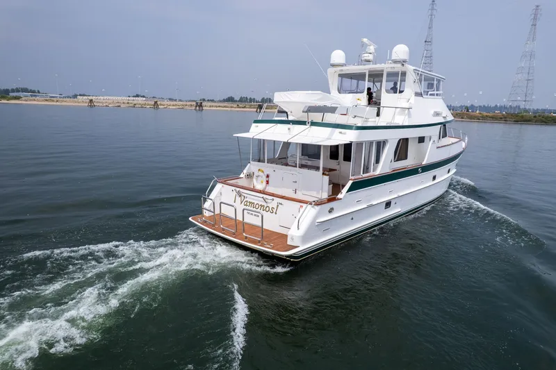 Slide: The Image of 2009 Outer Reef Yachts Motor Yacht cruising on calm waters. - 54