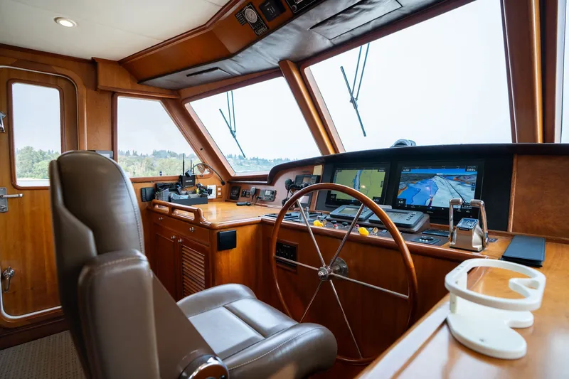 Slide: The Image of Luxurious 2009 Outer Reef Yachts motor yacht helm with advanced navigation systems. - 12
