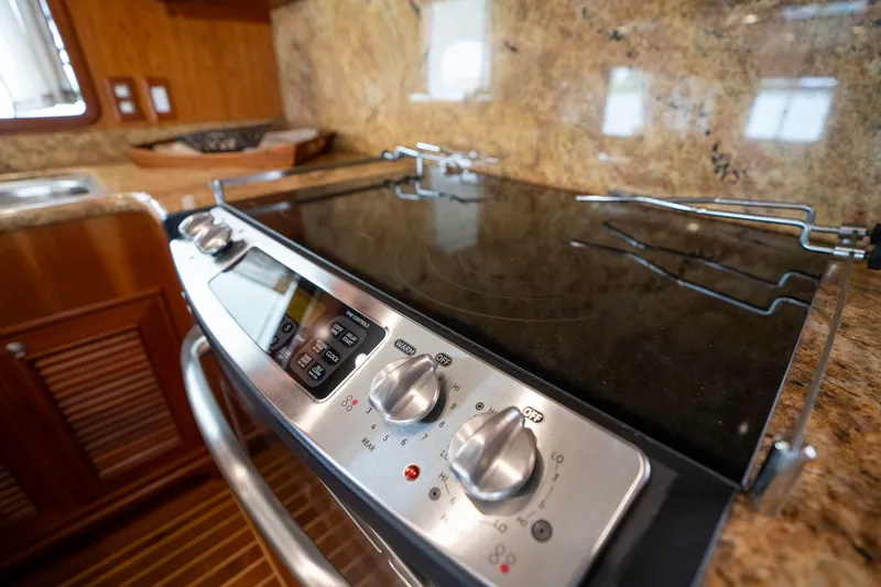 Slide: The Image of Modern kitchen stove in 2009 Outer Reef Yachts motor yacht galley. - 8