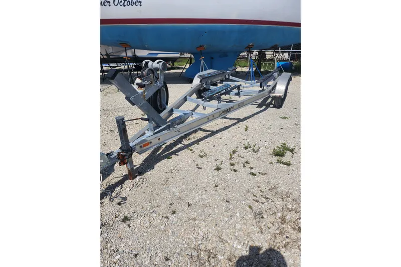 Slide: The Image of Boat trailer on gravel, ready for a 2014 Scout 210 XSF. - 10