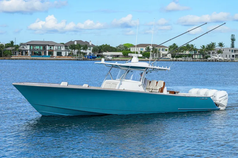 Slide: The Image of 2020 Valhalla V-41 boat on water, featuring sleek design and powerful engines. - 6