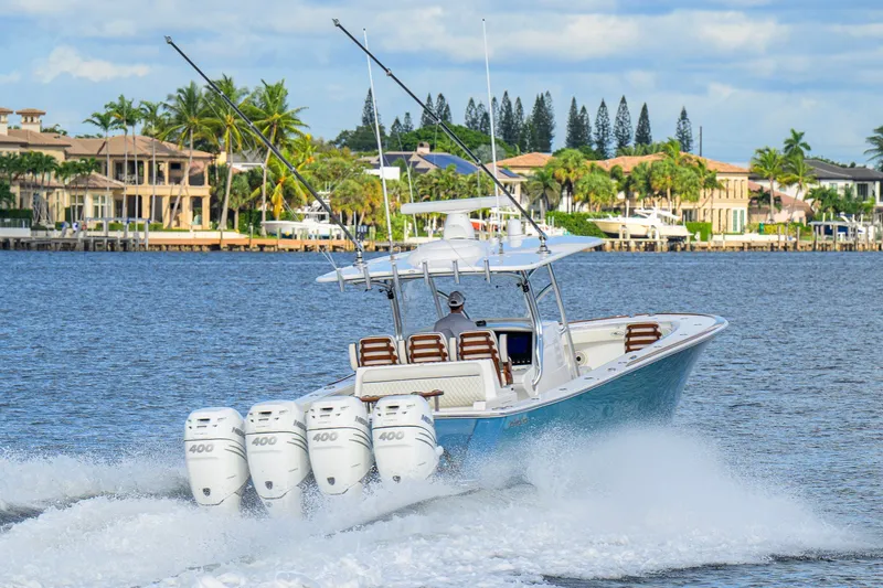 Slide: The Image of Valhalla V-41 boat cruising on water, showcasing powerful engines, 2020 model. - 15