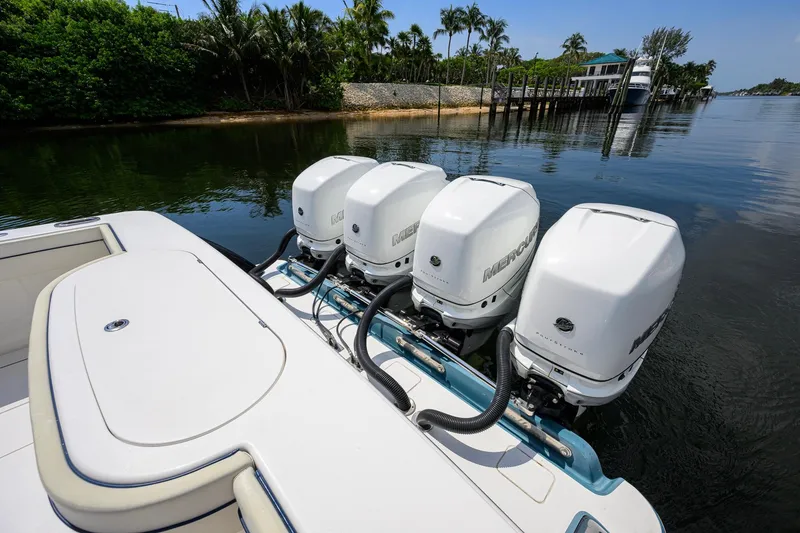 Slide: The Image of 2020 Valhalla Boatworks V-41 with four Mercury outboard engines on calm water. - 72