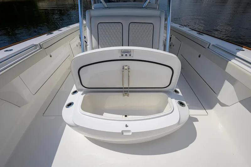 Slide: The Image of 2020 Valhalla Boatworks V-41 interior with open storage compartment on deck. - 38