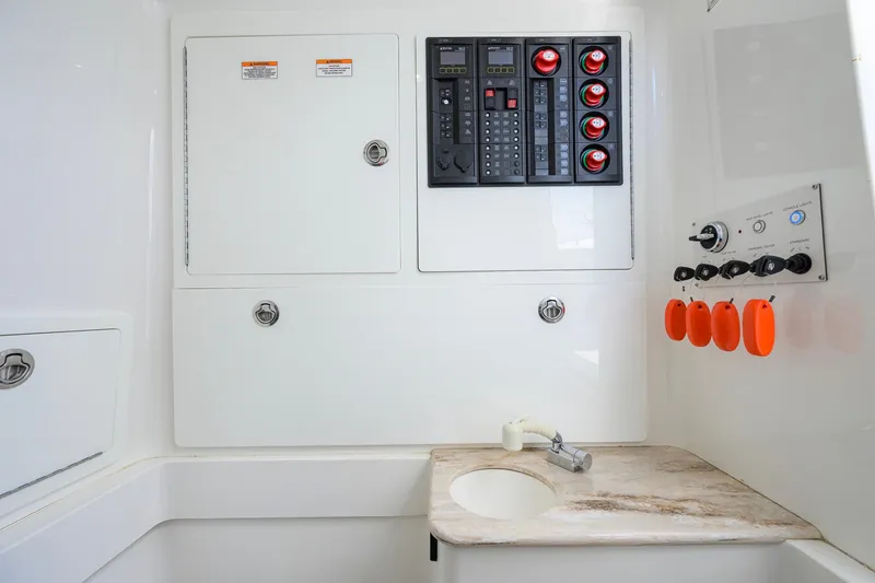 Slide: The Image of Control panel and sink area inside 2020 Valhalla Boatworks V-41 boat cabin. - 69