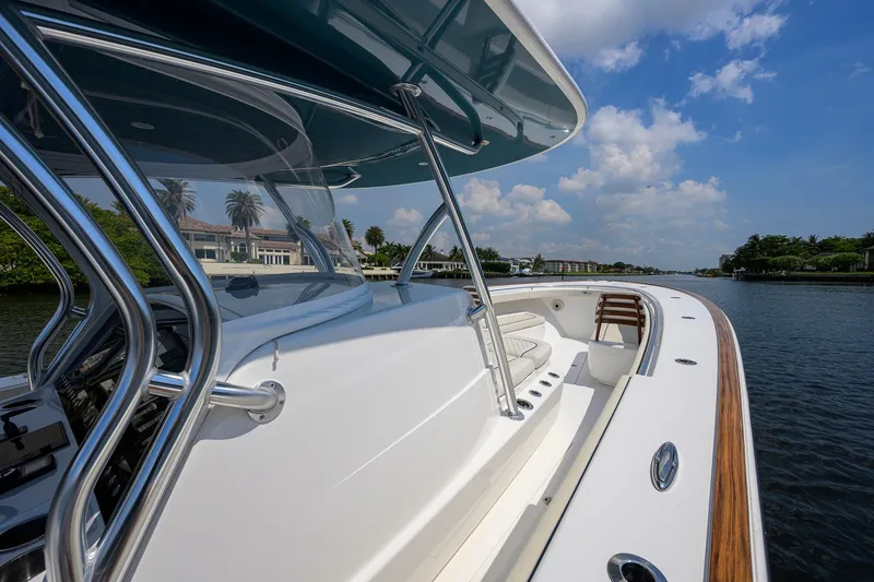 Slide: The Image of 2020 Valhalla Boatworks V-41 on a sunny day, showcasing sleek design and waterfront view. - 45