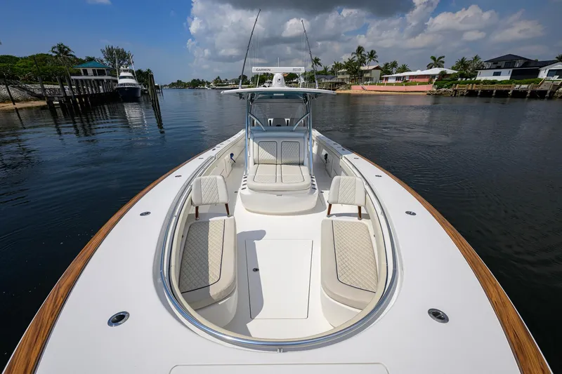 Slide: The Image of 2020 Valhalla Boatworks V-41 on calm water, showcasing spacious deck and seating. - 35