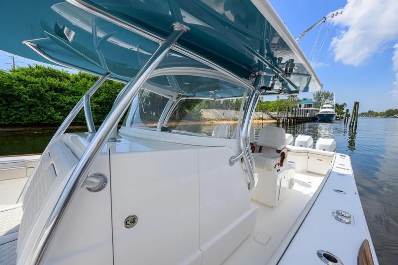 Slide: The Image of 2020 Valhalla Boatworks V-41, sleek design, docked by lush greenery and calm waters. - 27