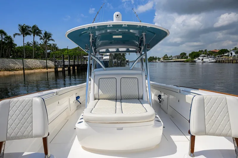 Slide: The Image of 2020 Valhalla Boatworks V-41 on calm water, featuring luxurious seating and sleek design. - 37