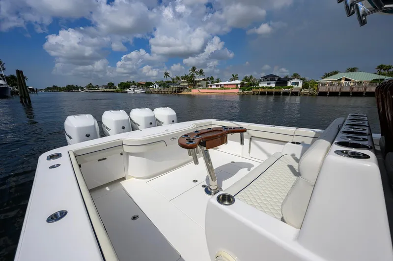 Slide: The Image of 2020 Valhalla Boatworks V-41, spacious deck, luxurious seating, and multiple outboard engines. - 48