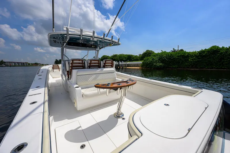 Slide: The Image of 2020 Valhalla Boatworks V-41 on calm water, featuring sleek design and comfortable seating. - 55