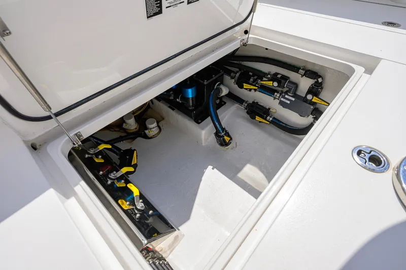 Slide: The Image of 2020 Valhalla Boatworks V-41 engine compartment with visible wiring and components. - 64