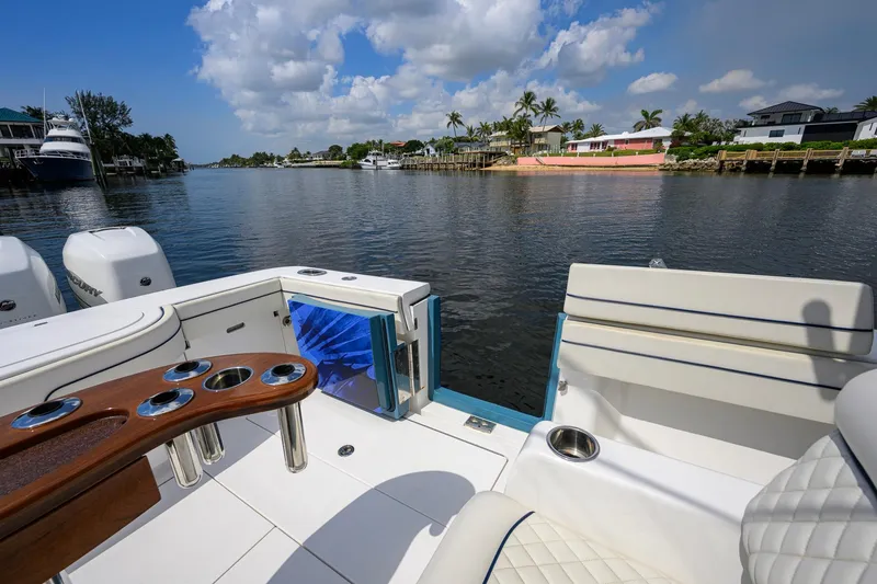 Slide: The Image of 2020 Valhalla Boatworks V-41 on calm water, featuring luxurious seating and fishing amenities. - 56