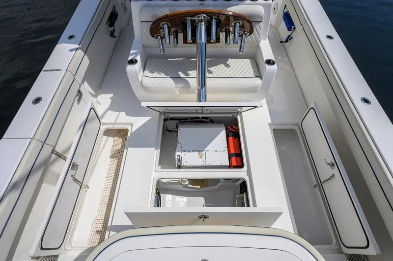 Slide: The Image of 2020 Valhalla Boatworks V-41 interior with open storage compartments and seating. - 60