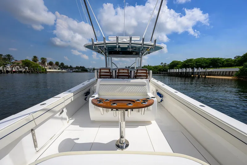 Slide: The Image of 2020 Valhalla Boatworks V-41 on calm water, showcasing spacious deck and seating. - 54