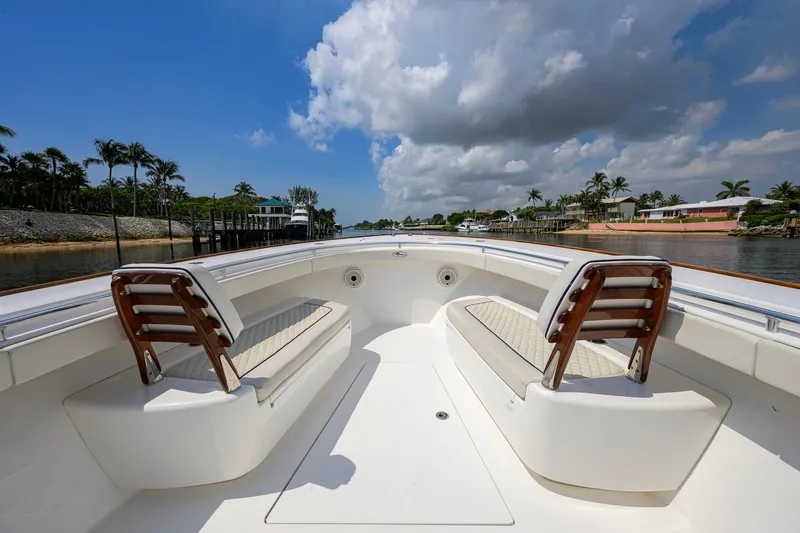 Slide: The Image of 2020 Valhalla Boatworks V-41 interior with seating, under a partly cloudy sky. - 31