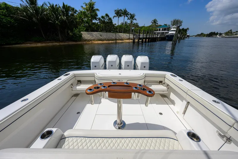 Slide: The Image of 2020 Valhalla Boatworks V-41 with quad engines, docked in a scenic waterfront setting. - 50