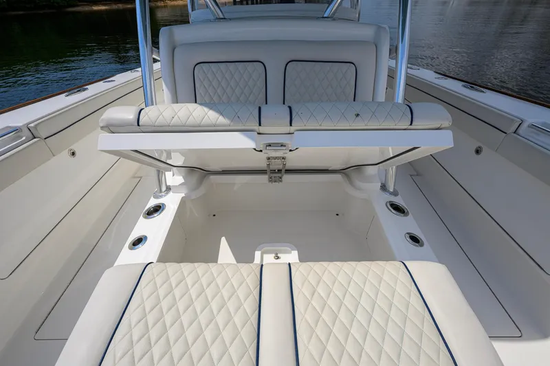 Slide: The Image of 2020 Valhalla Boatworks V-41 interior with diamond-stitched seating and storage compartment. - 40