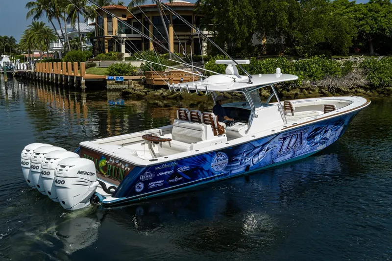 Slide: The Image of 2020 Valhalla Boatworks V-41 with vibrant graphics and four Mercury 400 engines. - 3