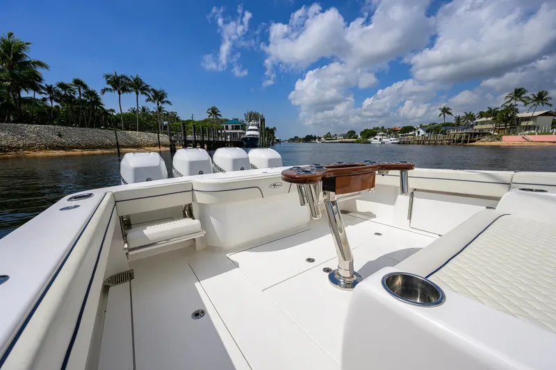 Slide: The Image of 2020 Valhalla Boatworks V-41 on calm water, featuring spacious deck and luxurious seating. - 51