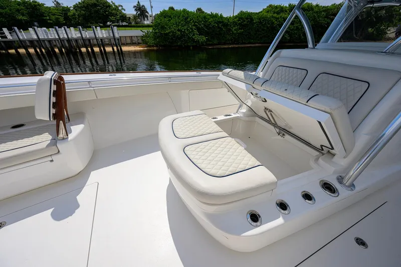 Slide: The Image of 2020 Valhalla Boatworks V-41 interior with cushioned seating and storage compartment. - 41