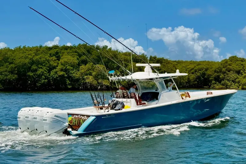 Slide: The Image of 2020 Valhalla Boatworks V-41 cruising on a sunny day with fishing rods. - 2