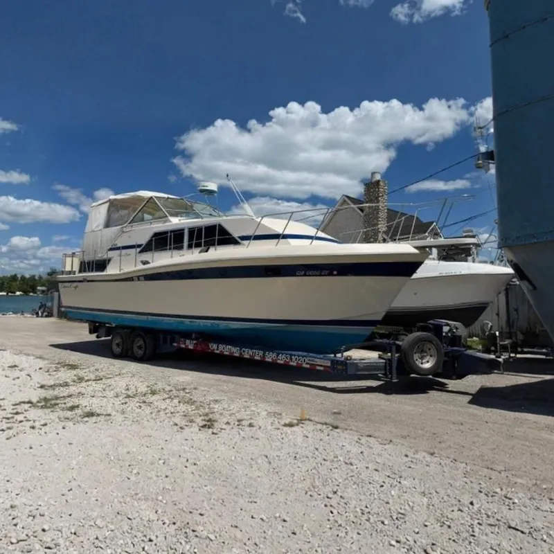 The Image of 1980 Chris-Craft 381 Catalina boat under the blue sky. - 0