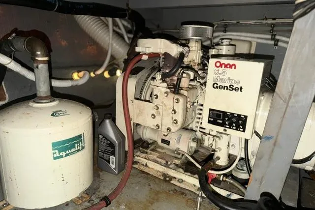 Slide: The Image of Engine room of 1980 Chris-Craft 381 Catalina with Onan 6.5 Marine GenSet generator. - 29