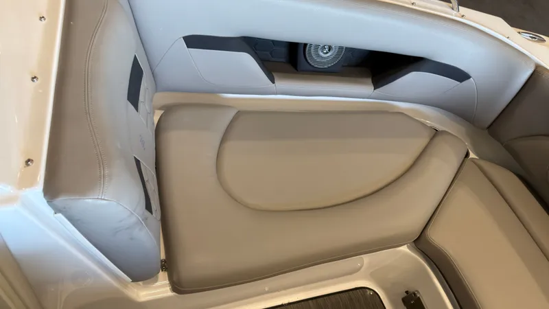 Slide: The Image of The image shows beige upholstery in a boat, likely a seating area. - 32