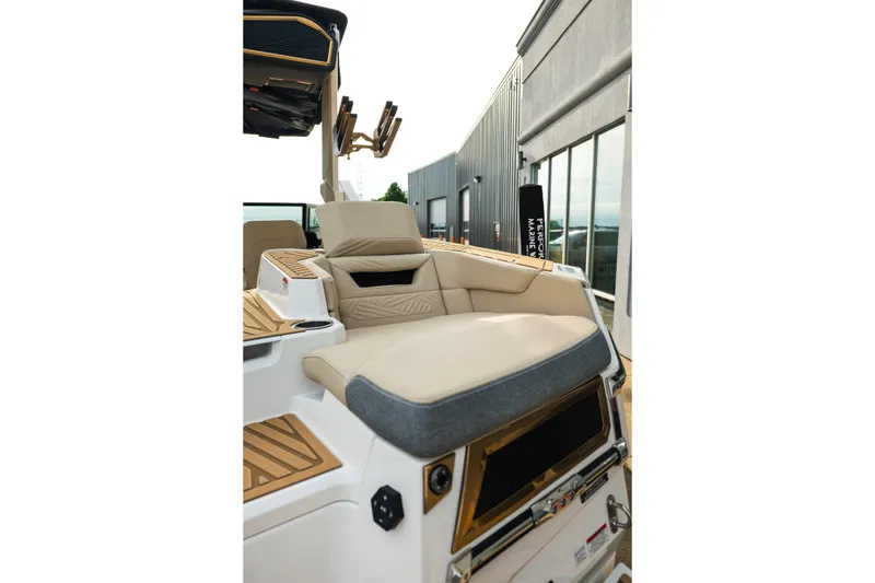 Slide: The Image of 2026 MasterCraft XStar 23 boat interior with luxurious seating and modern design. - 10