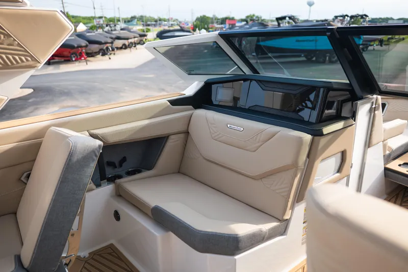 Slide: The Image of Interior of 2026 MasterCraft XStar 23 boat with beige seating and modern design. - 22