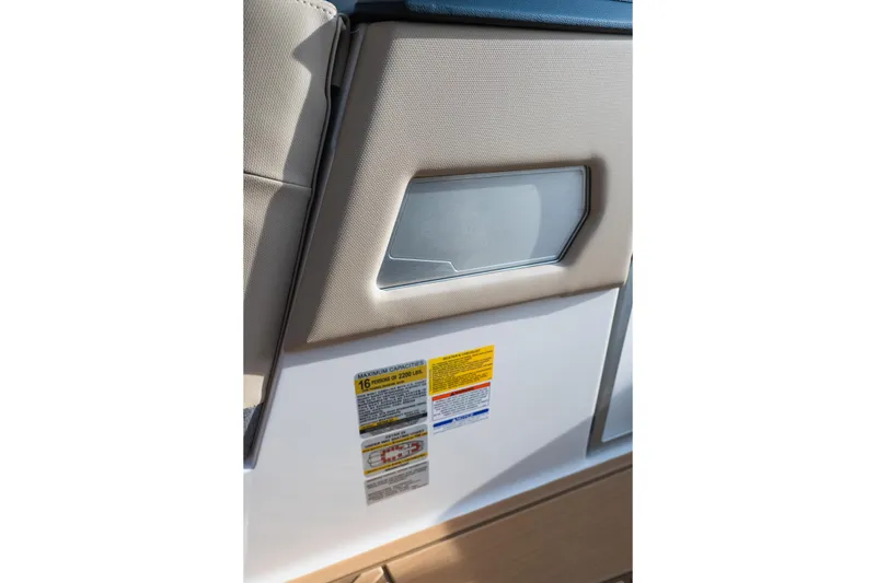 Slide: The Image of Interior detail of 2026 MasterCraft XStar 23 boat, featuring seating and capacity label. - 30