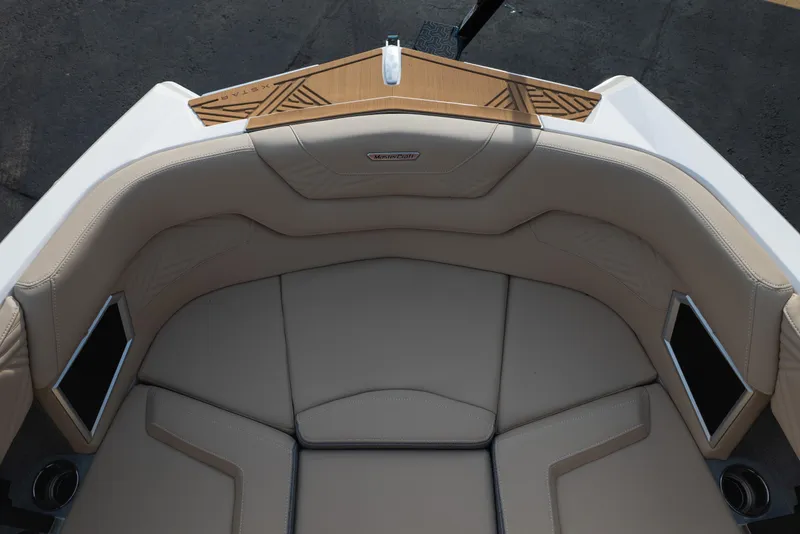 Slide: The Image of 2026 MasterCraft XStar 23 boat interior with beige seating and stylish design. - 33