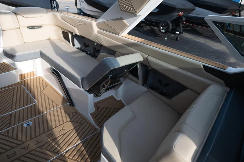 Slide: The Image of 2026 MasterCraft XStar 23 interior with luxurious seating and stylish flooring design. - 35