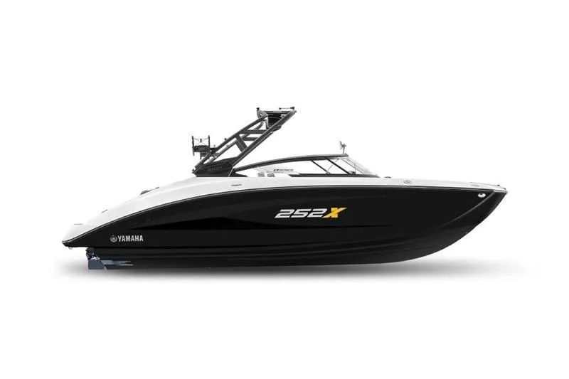 The Image of 2023 Yamaha 252XE boat, sleek black and white design, side view. - 1