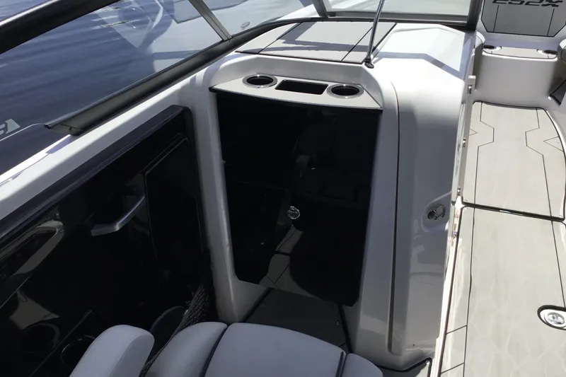 Slide: The Image of 2023 Yamaha Boats 252XE interior with sleek design and modern amenities. - 19