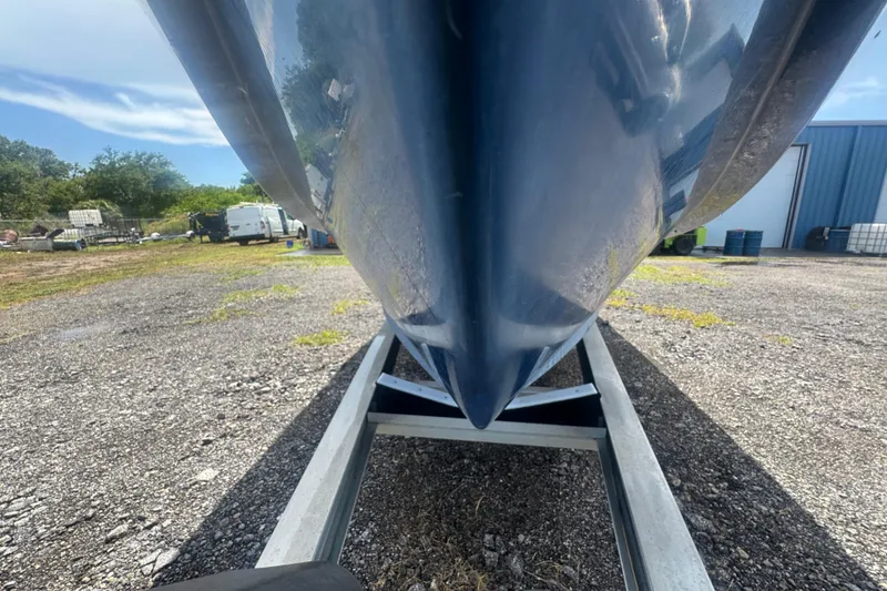 Slide: The Image of Close-up of a 2007 Contender 33 Tournament boat hull on a trailer. - 11