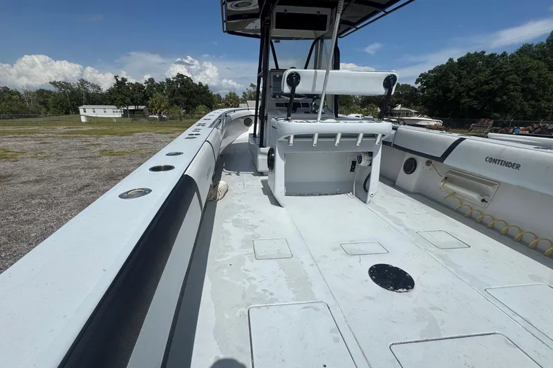 Slide: The Image of The image shows the deck of a 2007 Contender 33 Tournament boat. - 13